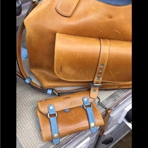 Leather wallet. Whiskey and blue suede